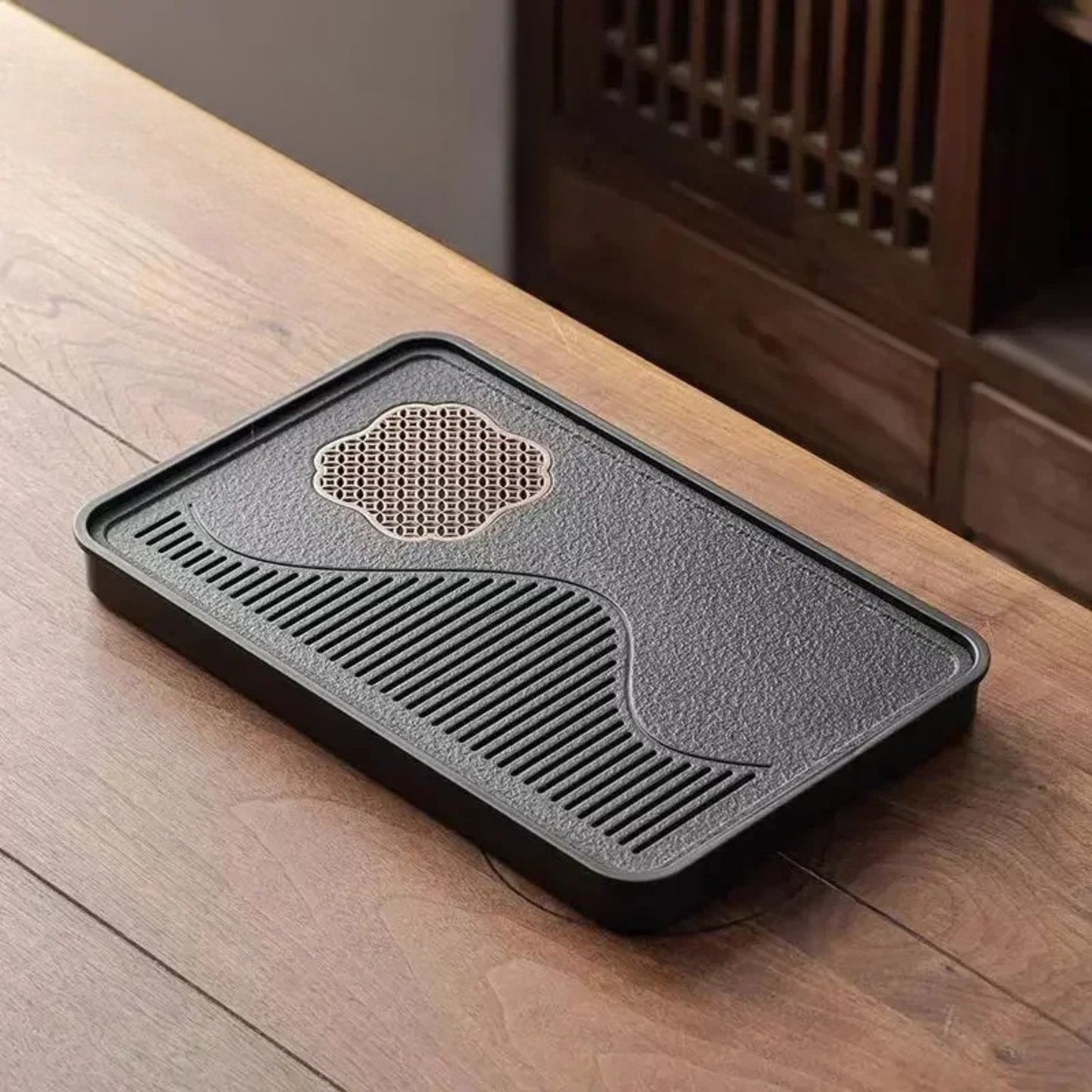 ongfu Cha Pan Stone Drainage Tea Tray β angled view, cloud-shaped copper lattice with wave drainage grooves | CL House
