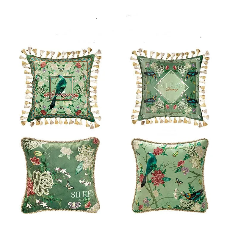 All four "Garden Silk" velvet cushion cover designs — Springing and Silken Blooming with gold tassel trim (top row), Silken Blooming and Springing with gold braided piping (bottom row), chinoiserie botanical print on green velvet