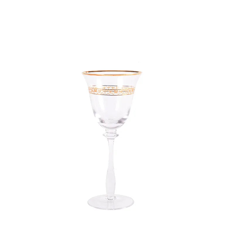 Single crystal wine glass with gold filigree rim and engraved band, front view on white background — 9.5cm wide, 20cm tall