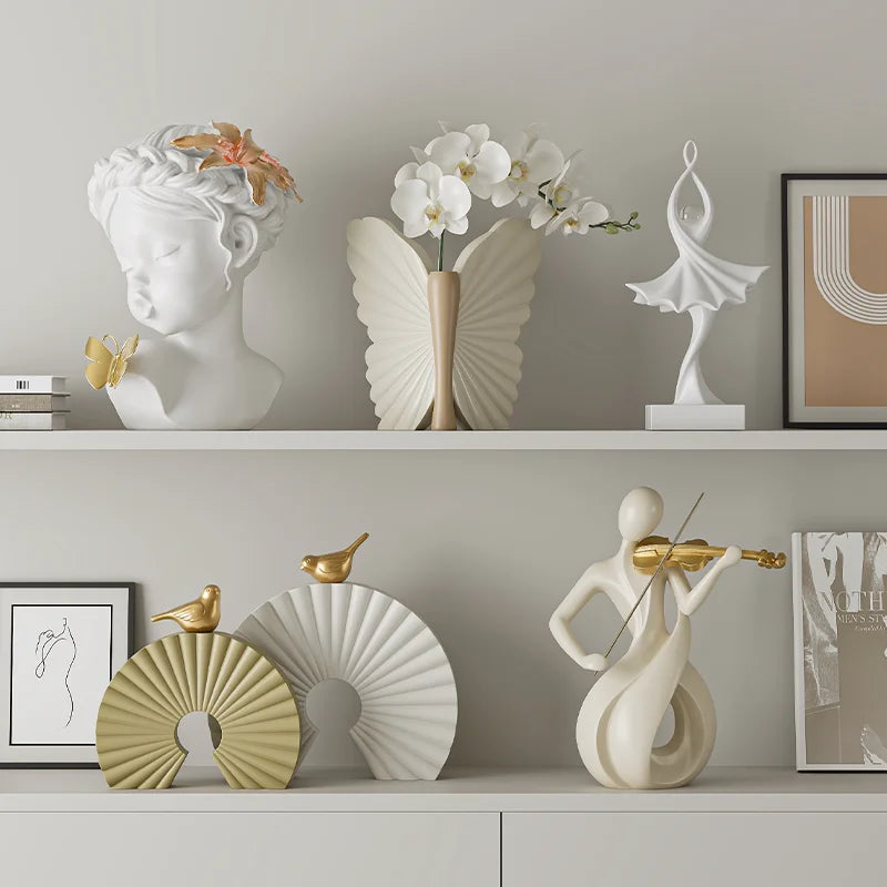 "The Violinist" abstract resin sculpture, styled on bookshelf, CL House