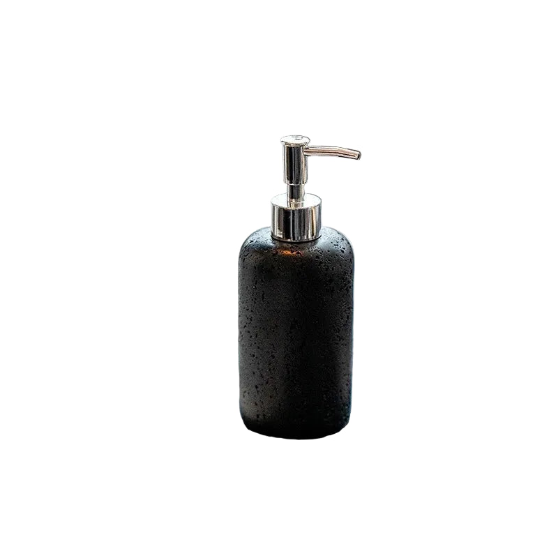 Midnight Stone travertine-texture soap dispenser with polished chrome pump, full front view on white background showing deep dark pitted stone finish
