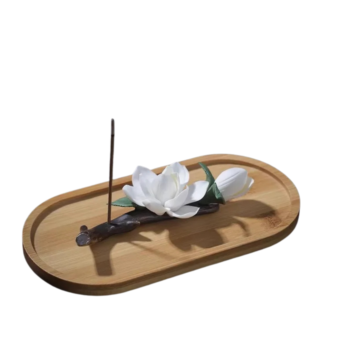 "Lotus Rest" Bamboo Incense Holder — close-up of handcrafted white ceramic lotus flower with green leaves on natural bamboo tray, wabi-sabi decorative accent