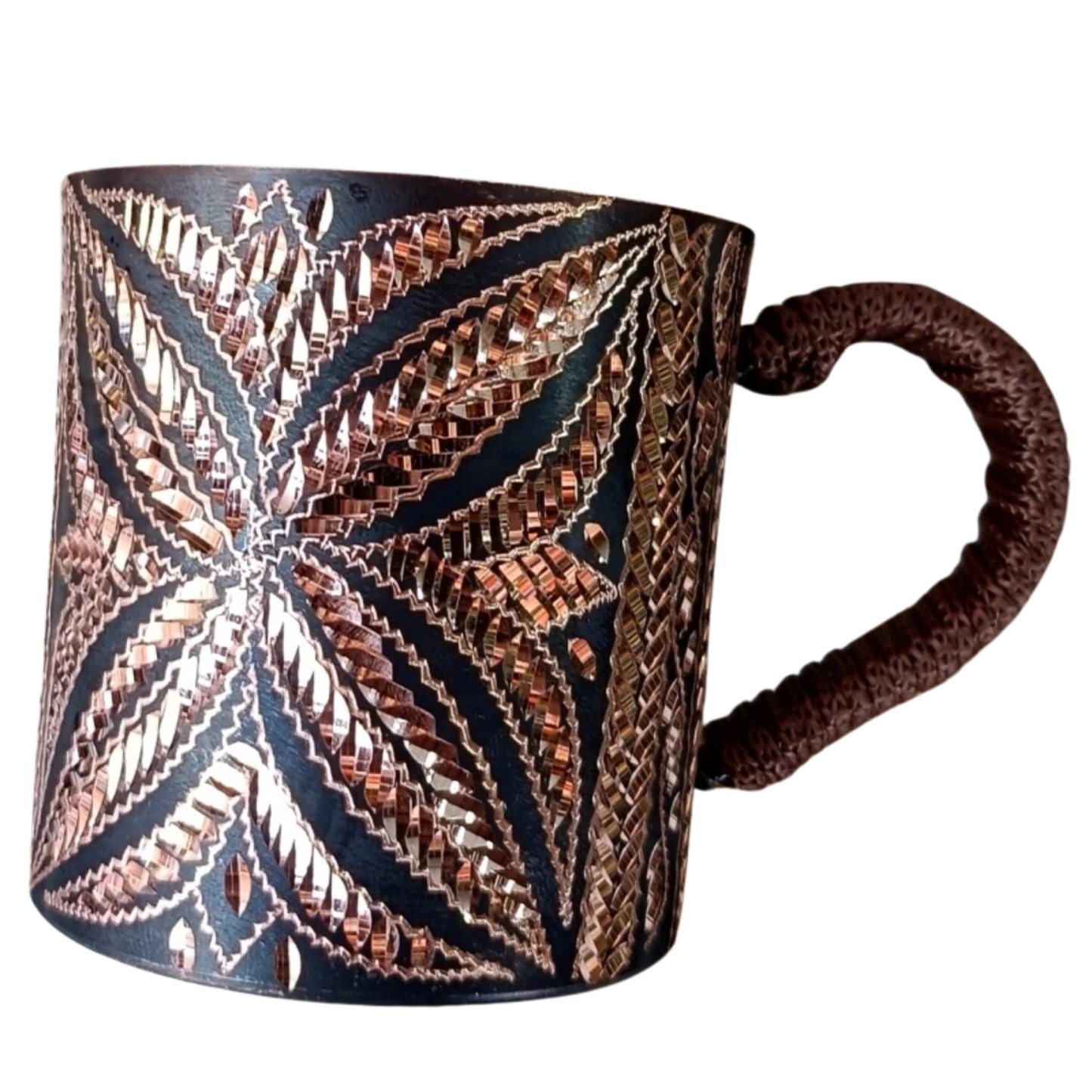 "Artisan's Mark" handcrafted copper mug held from below, full pattern detail — CL House