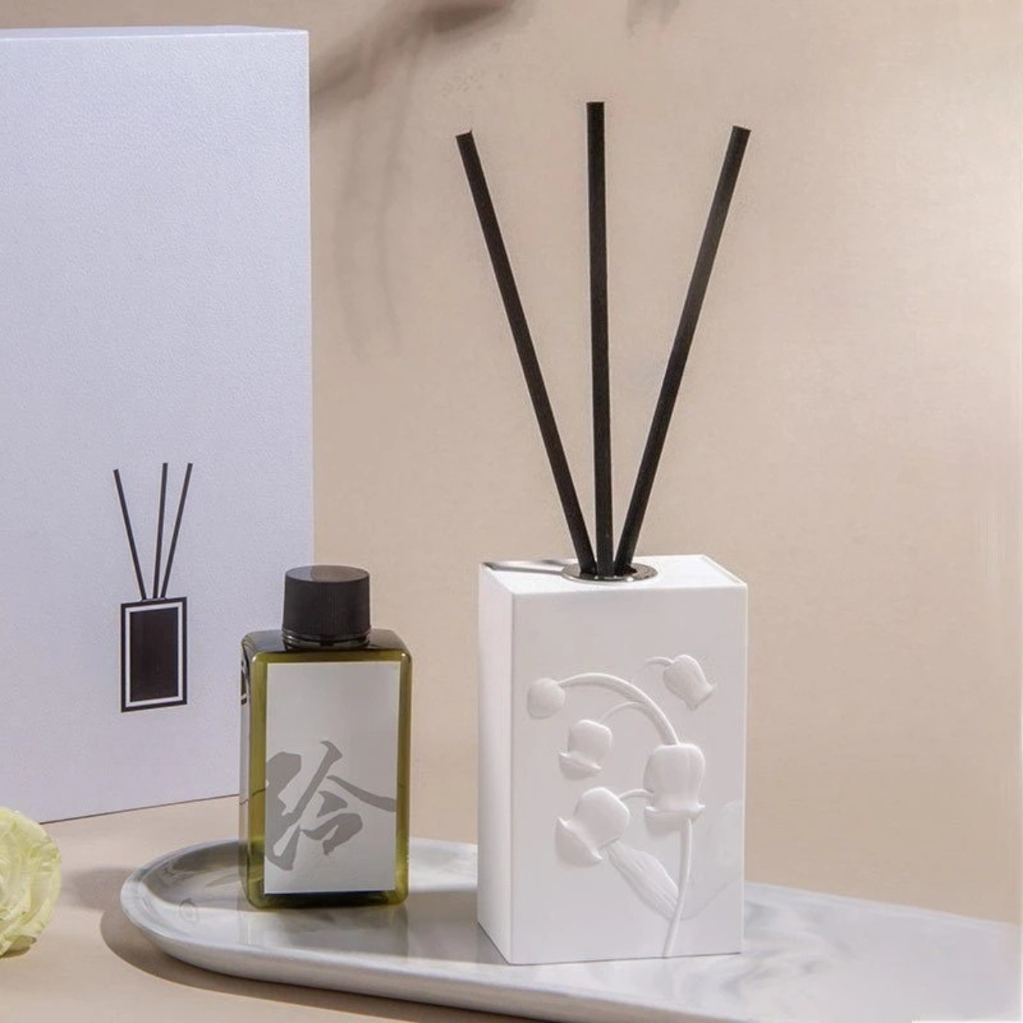  "Lotus Bloom" ceramic reed diffuser set — white porcelain with tulip embossed relief and fragrance oil on marble tray — CL House