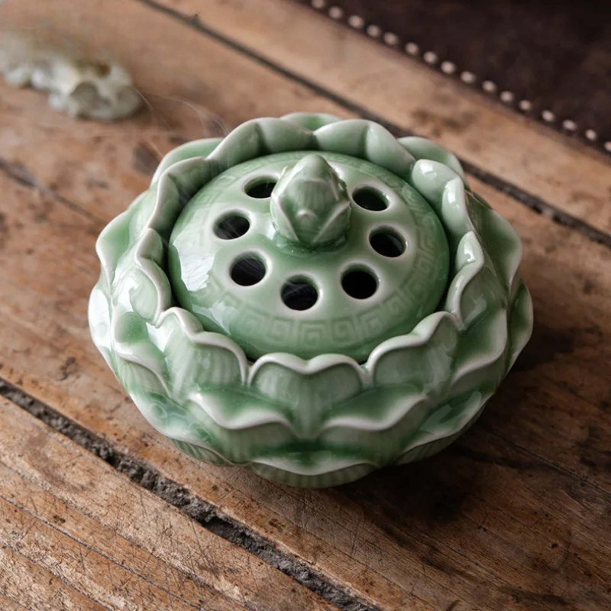 "Lotus Bloom" celadon ceramic incense burner — full view in sage green — CL House