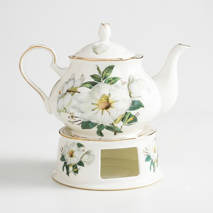 "White magnolia bone china teapot with gold trim on ceramic warmer stand, 900ml — CL House Tea Time collection"