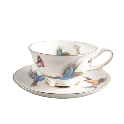 Blue Jay:


"White bone china teacup and saucer with blue jay botanical print and gold trim — CL House Tea Time"