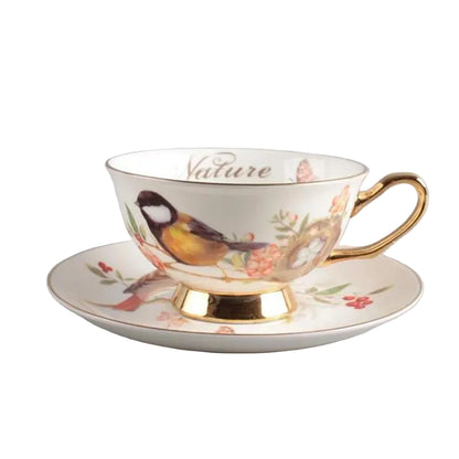 Great Tit:

"White bone china teacup and saucer with great tit bird on branch print and gold trim — CL House Tea Time"