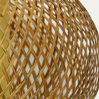 Close-up of hand-woven natural bamboo lattice shade of the Weave & Disc pendant light, showing the open diamond weave pattern and warm golden texture