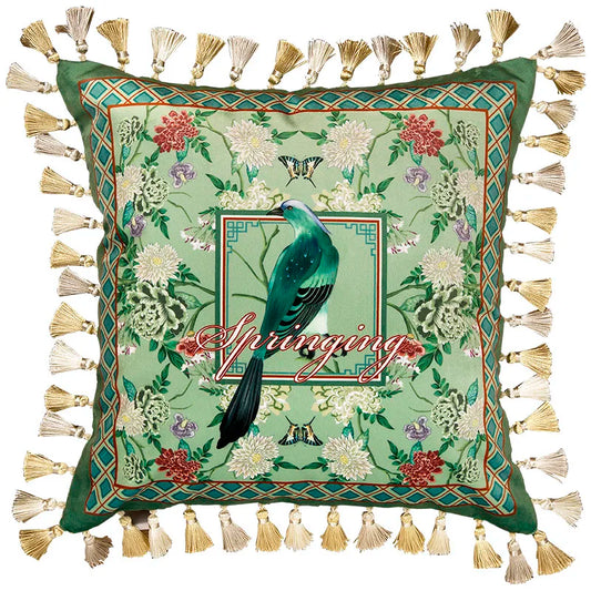 "Garden Silk" velvet cushion cover, Springing with tassels — sage green ground with turquoise long-tailed bird in central framed panel, "Springing" script, dark green diamond border, chrysanthemums and peonies, gold and cream