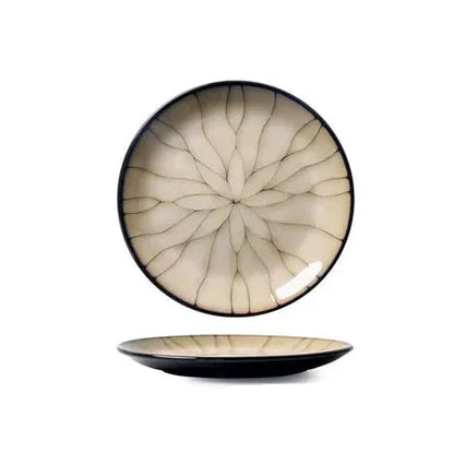 "Lotus Web" ceramic dinner plate in cream with dark kiln-change web glaze pattern — top view and side profile on white background