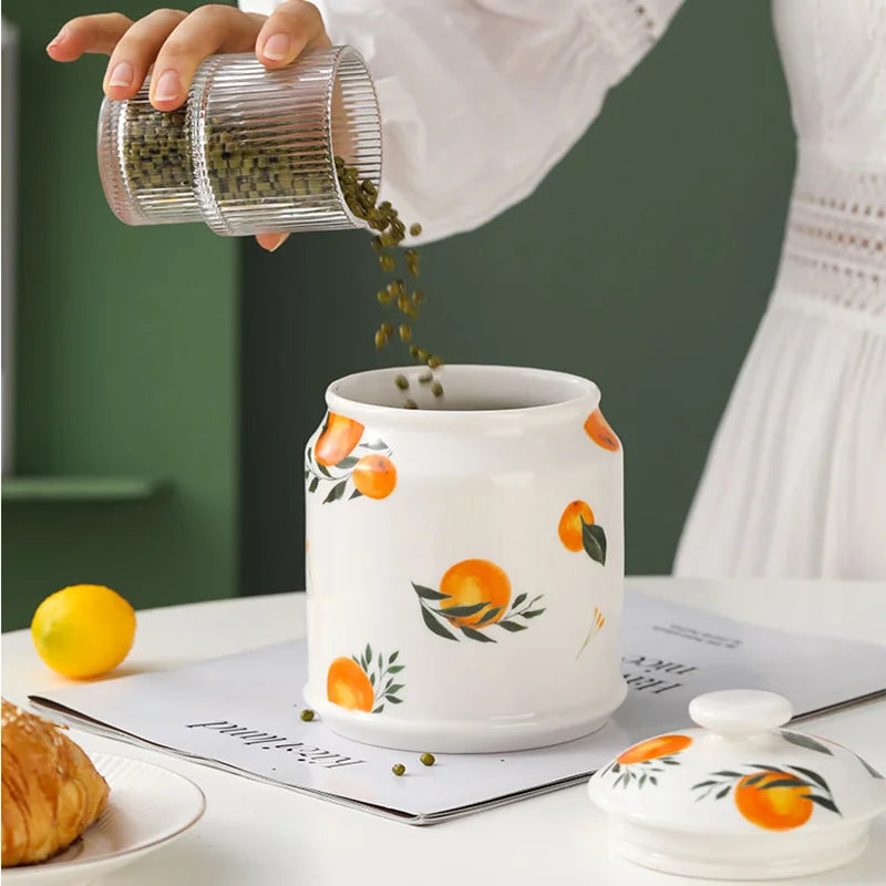 Lemon ceramic storage jar

Fruit shaped spice jar 

Citrus kitchen accessories

Lemon desktop organiser

Quirky food storage container

Yellow ceramic canister

Botanical kitchen supplies

Artisanal fruit storage bottle