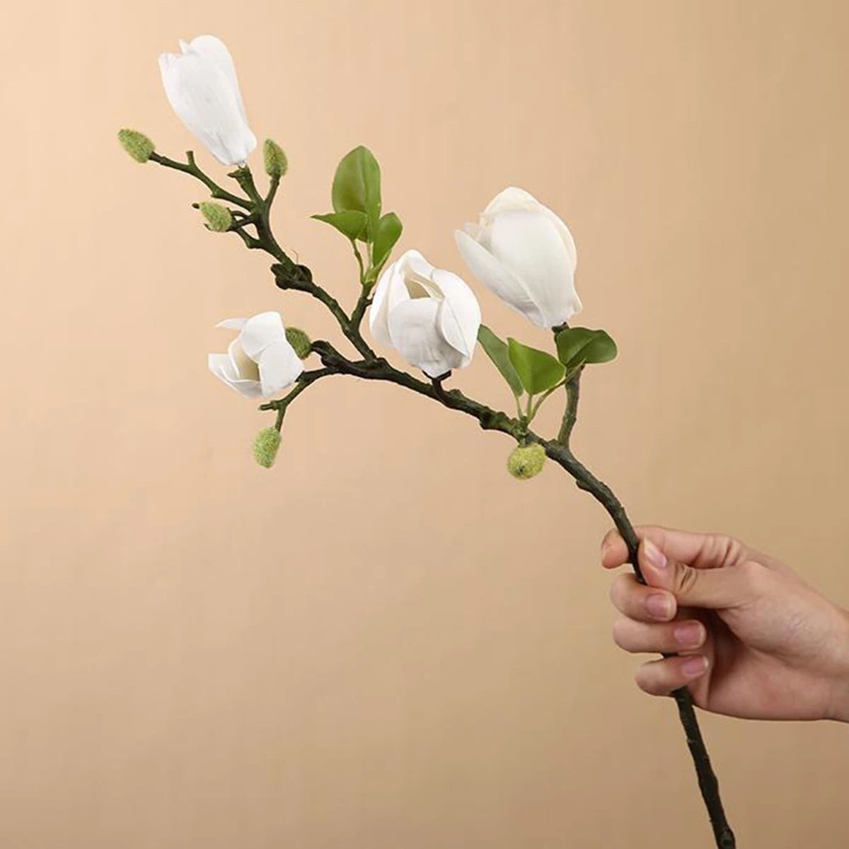 Silk magnolia bouquet

Artificial wedding flowers

Faux bridal bouquet

Magnolia floral props

Realistic silk flowers UK

Magnolia table centrepiece

Artificial garden decoration

DIY floral arrangement

Large faux magnolia stems