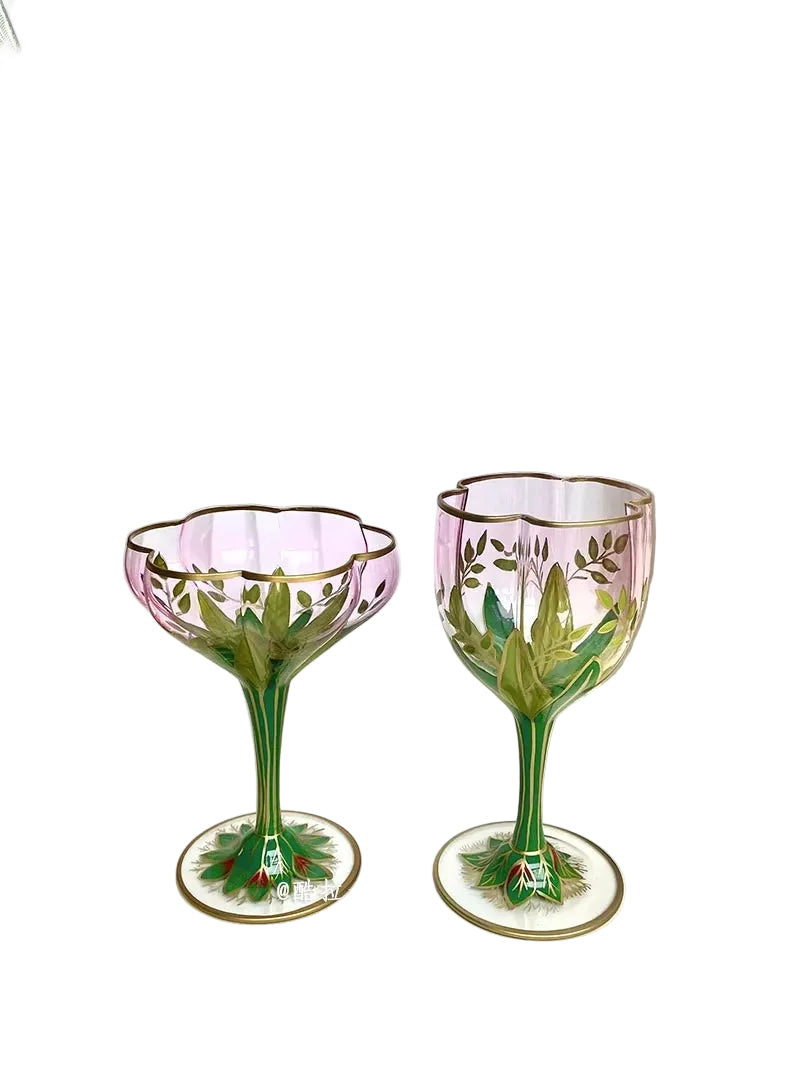 "Botanical Garden" hand-painted crystal martini glass and champagne flute side by side, delicate floral motif detail — CL House Drinkware collection