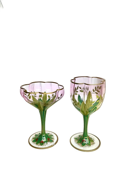"Botanical Garden" hand-painted crystal martini glass and champagne flute side by side, delicate floral motif detail — CL House Drinkware collection