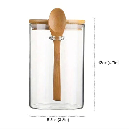 Glass storage jar with spoon

Bamboo lid kitchen canister

Airtight food container 

Kitchen organisation jars

Coffee and tea glass jar

Sustainable spice storage

Pantry glass canisters

Minimalist kitchen decor

550ml glass storage