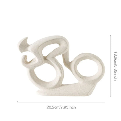 Abstract cyclist statue

Ceramic biker sculpture

Cycling gift ideas 

Minimalist office decor

Contemporary bike ornament

Cyclist shelf decoration

Modern art rider figurine

Road bike sculpture

Luxury cycling accessories

