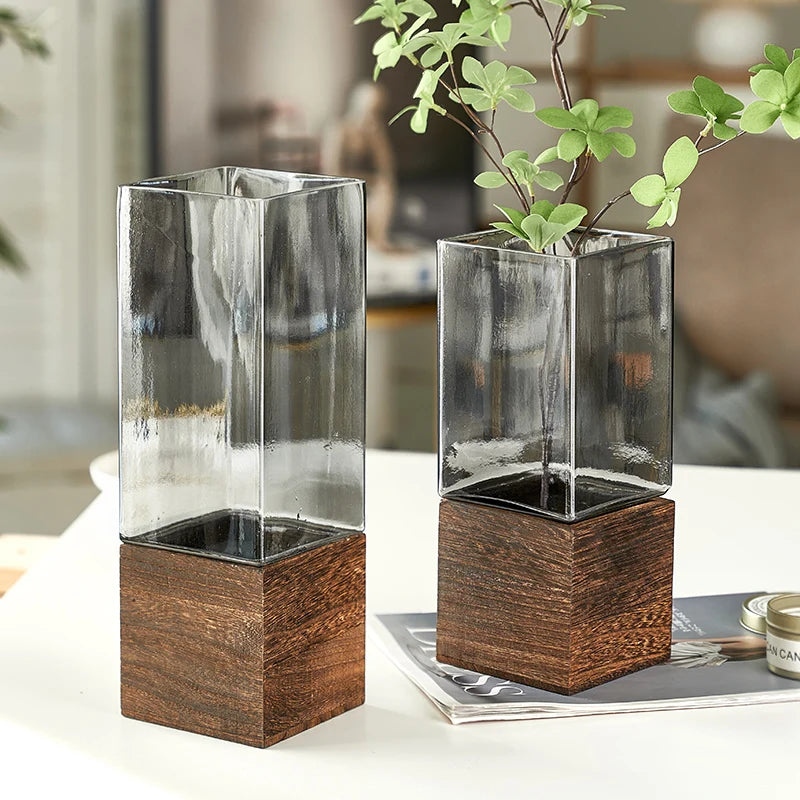"Timber & Glass" Square Stem Vase — Wide 9.5 × 25cm and Slim 7.5 × 25cm side by side, clear glass and dark wood, zen decor