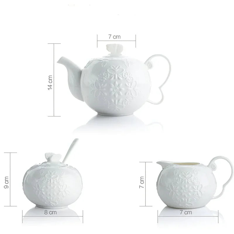 (Teapot):

"White embossed bone china teapot with floral relief and sculpted handle, British style — CL House Tea Time"
