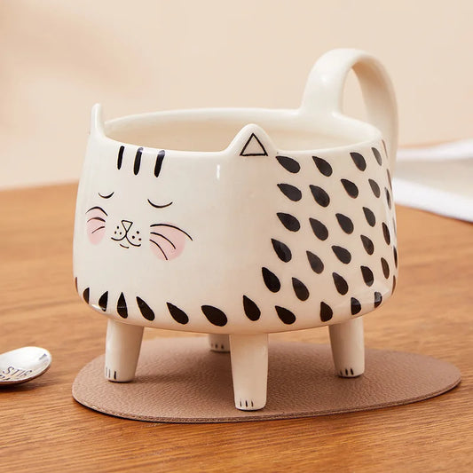 clHouse & Home
Cat coffee mug 

Novelty ceramic cat mug

Four-legged animal mug

Cute meow mug for girls

Funny cat lover gift

3D cat shaped mug

Kawaii kitchen accessories

Novelty tea cup with legs

Gift for cat ladies