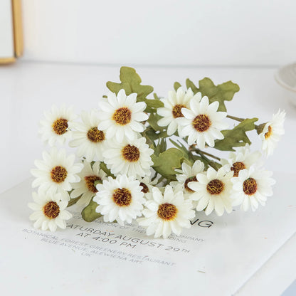 Artificial daisy flowers

Fake plant centrepieces

Wedding daisy bouquet

Handheld floral arrangement

Home party flower decor

Plastic daisies for vases

Festival flower bouquet

Maintenance-free home gifts

Artificial meadow flowers UK