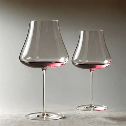  "Sommelier" wide bowl crystal wine glass filled with red wine, elegant long stem — CL House Drinkware collection