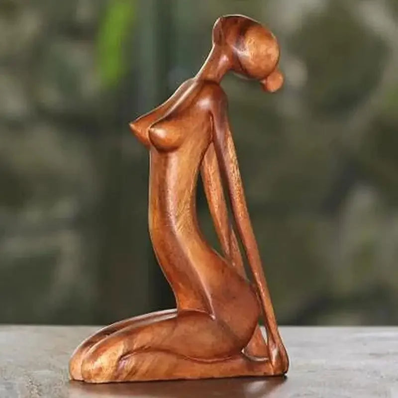 Still Forms Surrender — abstract wooden yoga figure folded forward in release pose, natural wood, zen decor