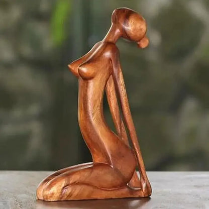 Still Forms Surrender — abstract wooden yoga figure folded forward in release pose, natural wood, zen decor