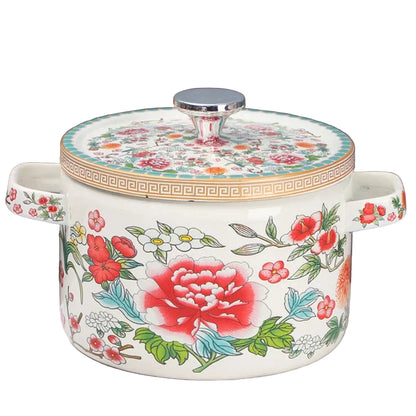 Floral enamel casserole with lid, Peony Garden design — bold red peonies and mixed blooms on cream enamel, gold Greek key border, steel knob, white background — Peony Garden by CL House
