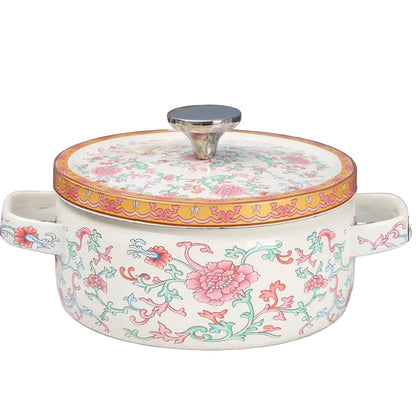 Floral enamel casserole with lid, Lotus Bloom design — pink peonies and green trailing vines on cream enamel, gold border, steel knob, white background — Peony Garden by CL House