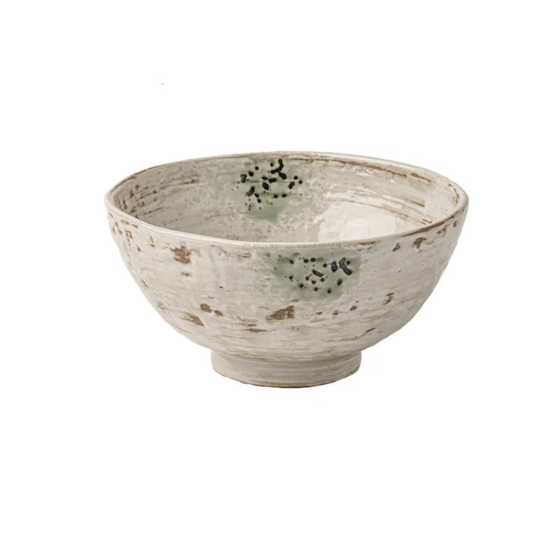Wabi-sabi stoneware noodle bowl with celadon reactive glaze and ink-spot markings, deep round shape on white background, 6.5in
