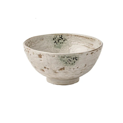 Wabi-sabi stoneware noodle bowl with celadon reactive glaze and ink-spot markings, deep round shape on white background, 6.5in