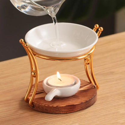 "Golden Arch" Ceramic Oil Burner – gold arch frame, white ceramic dish and wood base | CL House
