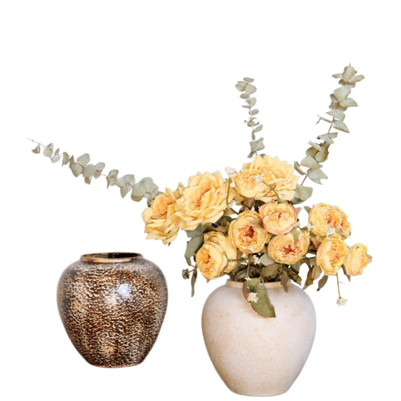  Round Earth ceramic pot vases in Ember Glaze and Stone Matte finishes styled with yellow roses and eucalyptus, white background