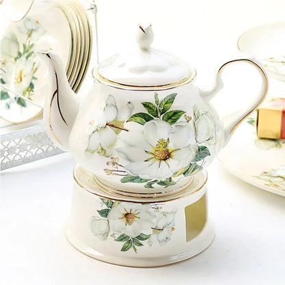 "White magnolia bone china teapot with gold trim on ceramic warmer stand, 900ml — CL House Tea Time collection"