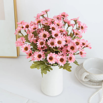 Artificial daisy flowers

Fake plant centrepieces

Wedding daisy bouquet

Handheld floral arrangement

Home party flower decor

Plastic daisies for vases

Festival flower bouquet

Maintenance-free home gifts

Artificial meadow flowers UK