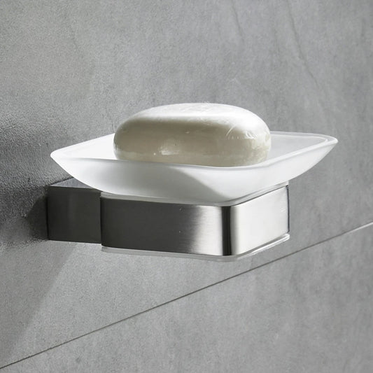  Wall-mounted frosted glass soap dish with brushed nickel stainless steel bracket installed on grey tile wall, white bar soap displayed