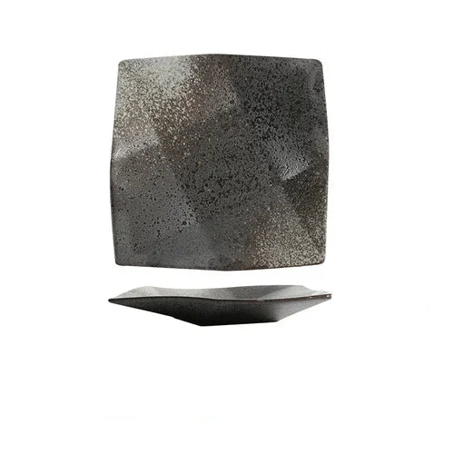 "Black Pearl" ceramic square dinner plate — front and side view on white background showing reactive glaze in deep obsidian with natural grey and silver speckled tones and softly curved square form — product shot
