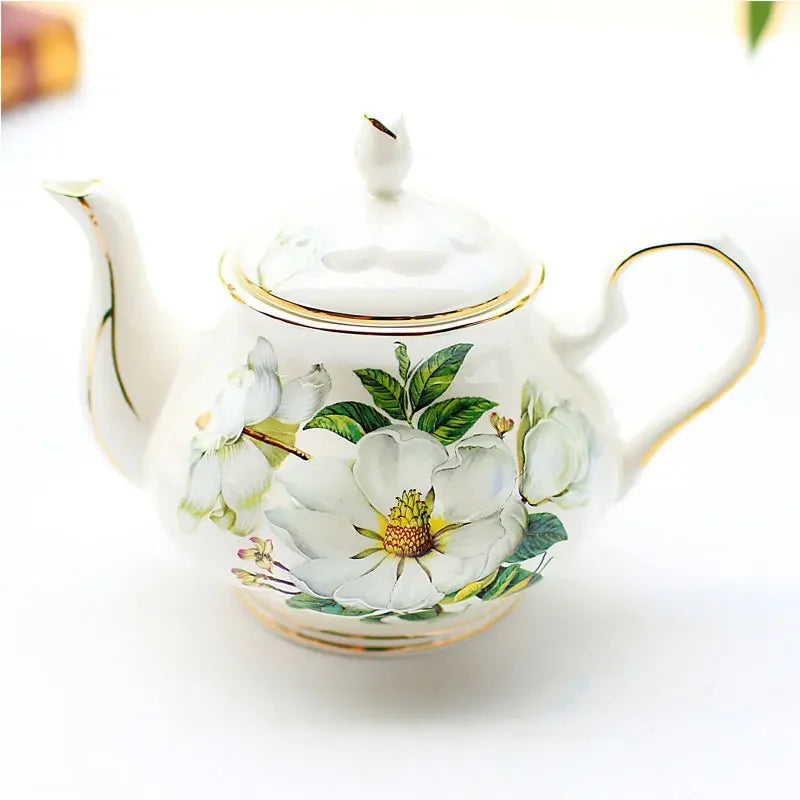 "White magnolia bone china teapot with gold trim on ceramic warmer stand, 900ml — CL House Tea Time collection"