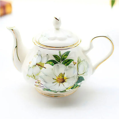 "White magnolia bone china teapot with gold trim on ceramic warmer stand, 900ml — CL House Tea Time collection"