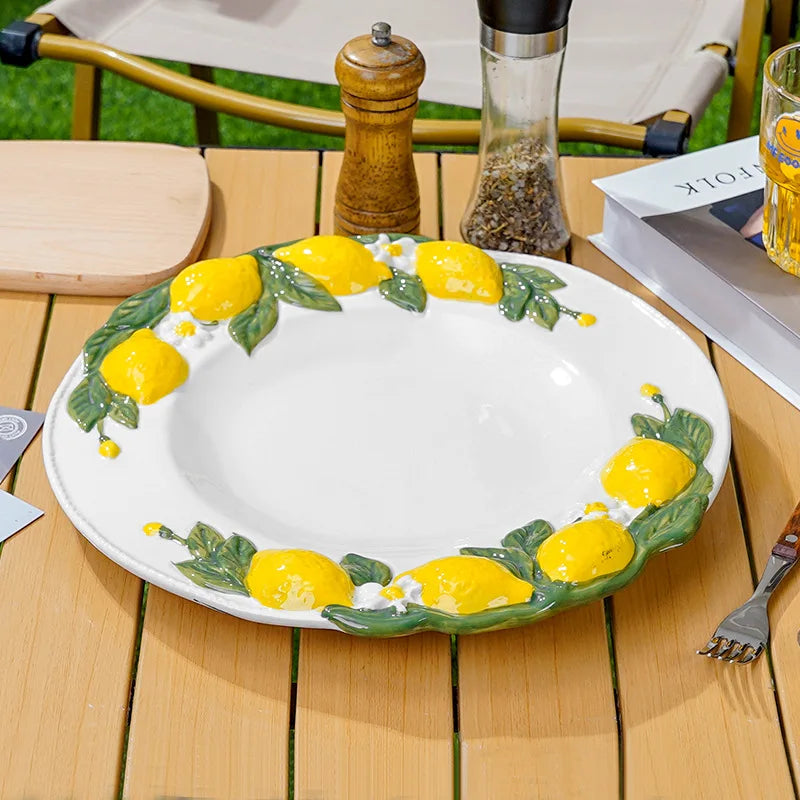Lemon relief ceramic plates

Textured dinnerware set 

Citrus fruit soup plates

Mediterranean style crockery

3D embossed ceramic bowls

Creative fruit pattern plates

Luxury household dining sets

Zesty kitchen decor

Artisanal ceramic tableware