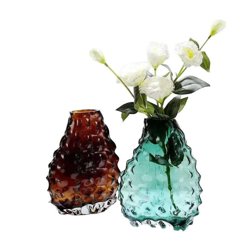 Glacier Peak textured glass vases in Amber Brown and Ocean Teal styled with white roses, white background
