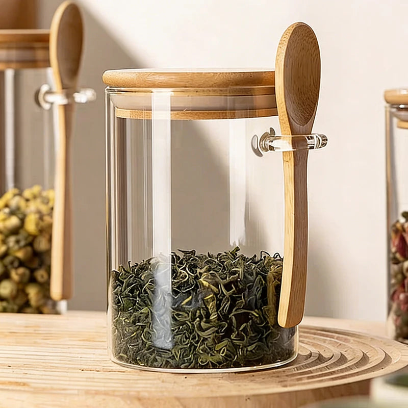 Glass storage jar with spoon

Bamboo lid kitchen canister

Airtight food container 

Kitchen organisation jars

Coffee and tea glass jar

Sustainable spice storage

Pantry glass canisters

Minimalist kitchen decor

550ml glass storage