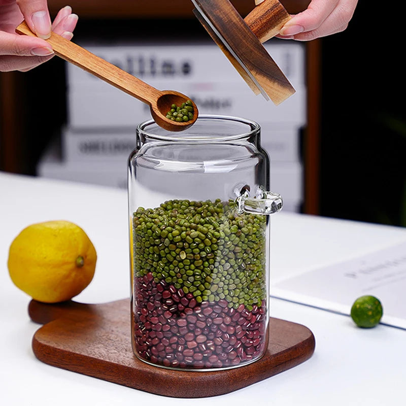Tea storage with integrated spoon

Pantry organisation containers

Modern glass larder jars

Kitchen storage canister

Glass Storage Jar with Integrated Spoon

Glass spice jar with wooden lid

Glass jar for sugar and salt

Eco-friendly kitchen storage

Coffee bean storage jar

Airtight glass jar with spoon