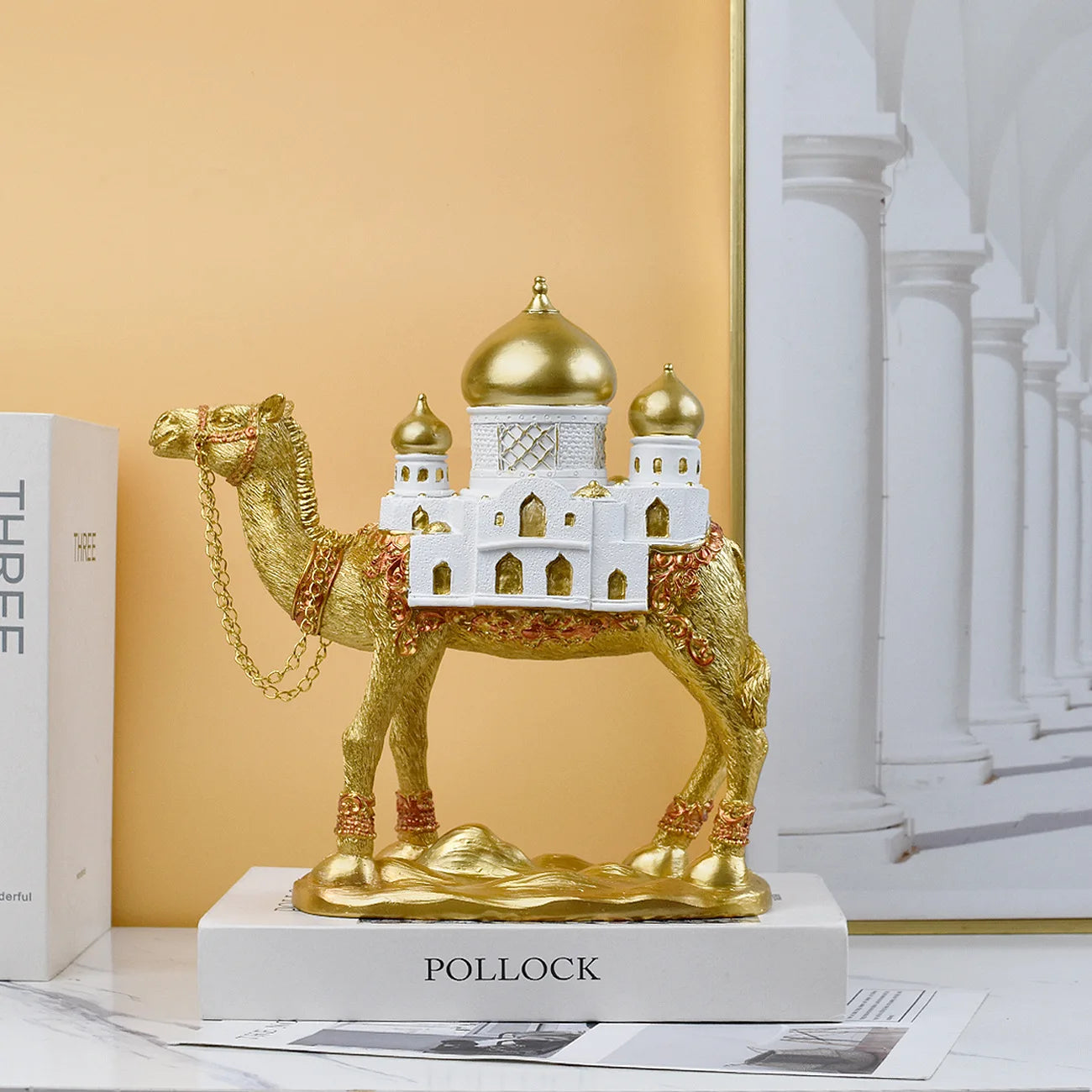 Camel statue 

Middle Eastern home decor

Desert animal sculpture

Arabian style ornaments

Shelf styling objects

Resin camel figurine

Exotic bookshelf decor

Hallway console ornaments

Minimalist animal statue