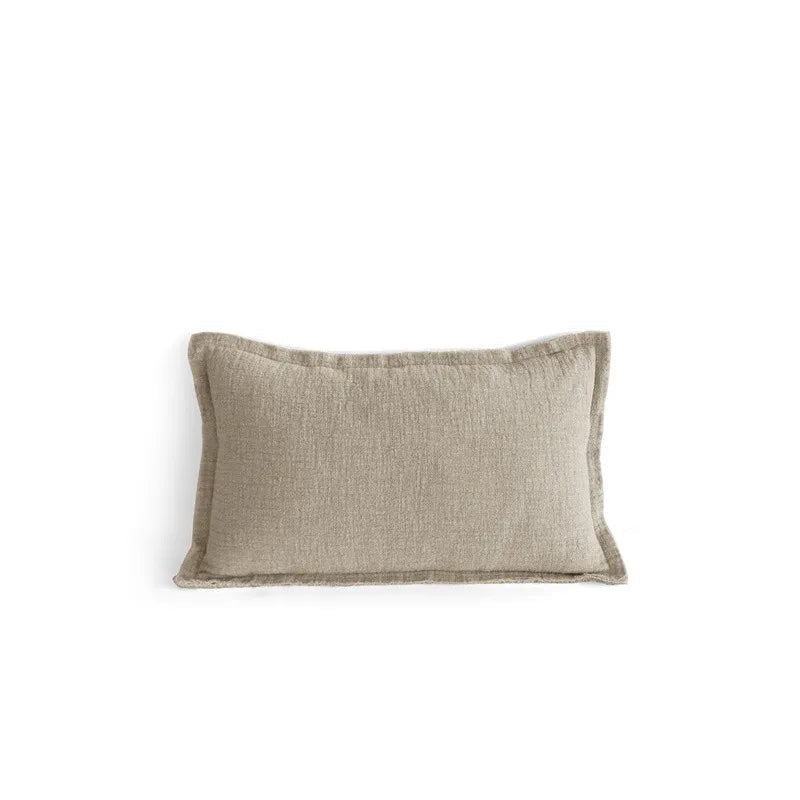 Natural linen lumbar cushion cover with delicate fringe edge, photographed on a white background — ramie-linen blend, 30x50cm, wabi-sabi minimalist home decor.