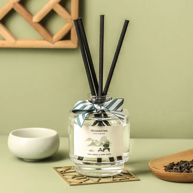 "Between Flowers" Reed Diffuser – Oriental Tea, glass bottle with black reeds | CL House