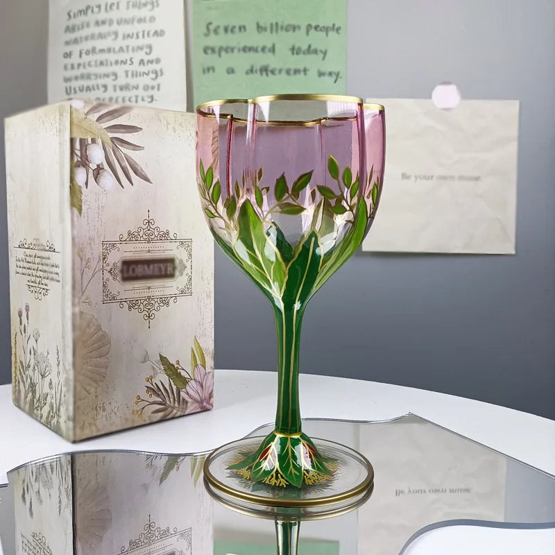  "Botanical Garden" hand-painted crystal champagne flute placed on a table, delicate floral motif detail — CL House Drinkware collection