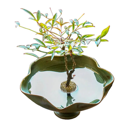  "Moss Stone hand-glazed ceramic lotus bowl with organic scalloped rim, wabi-sabi finish"
