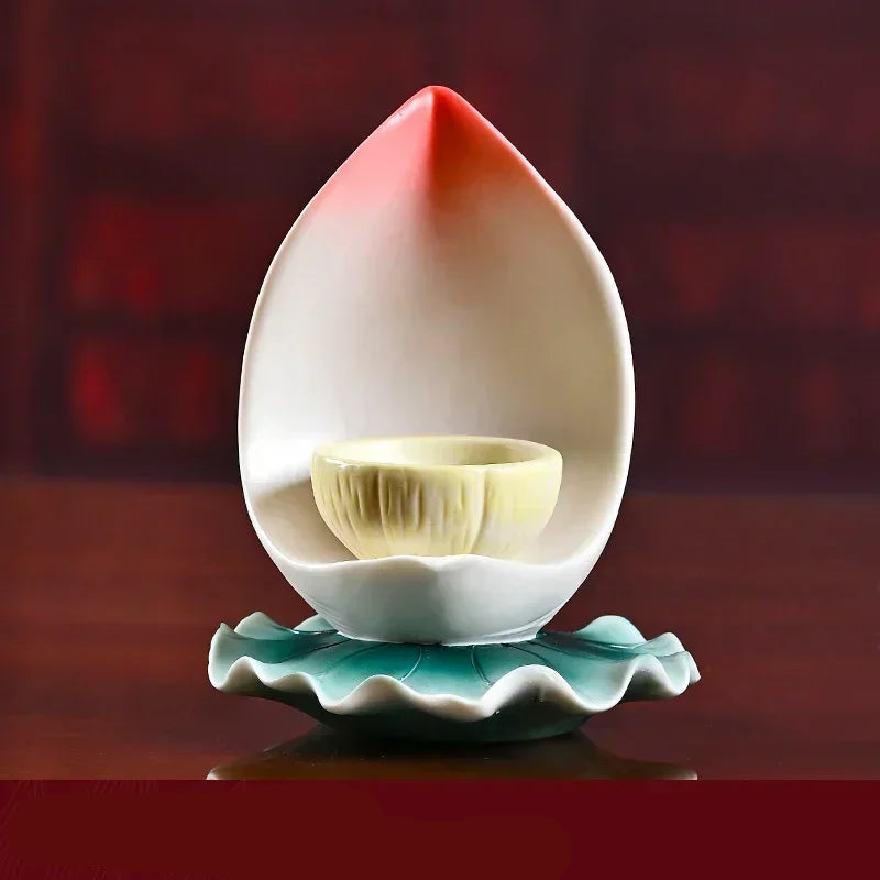 Ceramic lotus candle holder

Buddhist butter lamp holder

Feng Shui home decor UK

Lotus flower altar supplies

Spiritual home ornaments

Zen meditation accessories

Premium ceramic candle stand

High-grade Buddha ware

Decorative tea light holder
